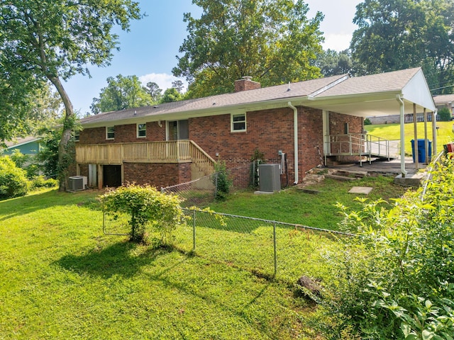 5229 Loblolly Ln, Ooltewah, TN 37363 - back of property with brick siding, a chimney, and stairway