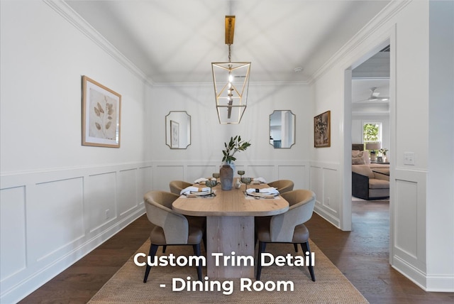 4707 Amethyst Rd Unit 891, Chattanooga, TN 37419 - dining area featuring crown molding, dark wood-style flooring, a decorative wall, and wainscoting