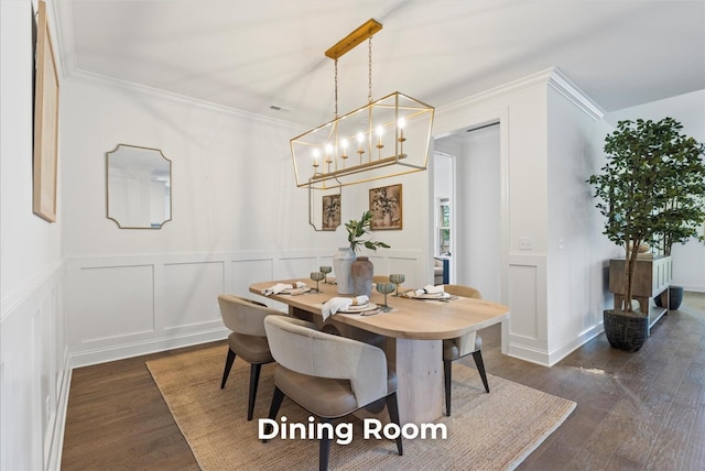 4707 Amethyst Rd Unit 891, Chattanooga, TN 37419 - dining area with dark wood finished floors, a chandelier, crown molding, a decorative wall, and a wainscoted wall