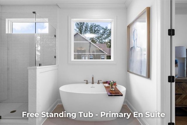 4707 Amethyst Rd Unit 891, Chattanooga, TN 37419 - bathroom featuring a freestanding tub, a stall shower, and crown molding