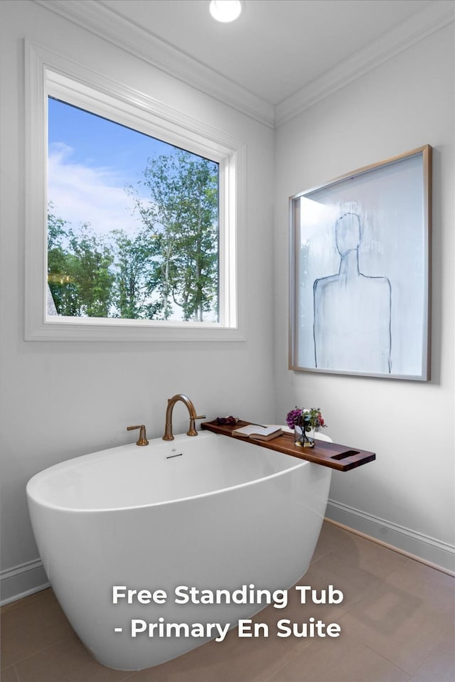 4707 Amethyst Rd Unit 891, Chattanooga, TN 37419 - bathroom with crown molding, a freestanding tub, and tile patterned floors