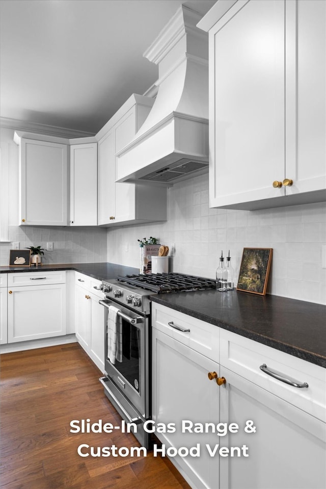 4707 Amethyst Rd Unit 891, Chattanooga, TN 37419 - kitchen with stainless steel range with gas cooktop, dark countertops, white cabinets, and custom exhaust hood