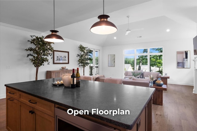 4707 Amethyst Rd Unit 891, Chattanooga, TN 37419 - kitchen featuring dark countertops, wood finished floors, a kitchen island, recessed lighting, and hanging light fixtures