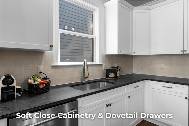 4707 Amethyst Rd Unit 891, Chattanooga, TN 37419 - kitchen featuring stainless steel dishwasher, white cabinetry, tasteful backsplash, and dark stone countertops