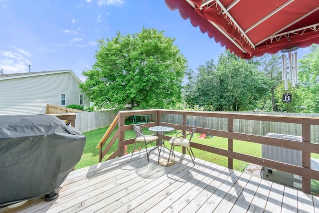 8202 Iris Rd, Chattanooga, TN 37421 - deck featuring a grill and a fenced backyard