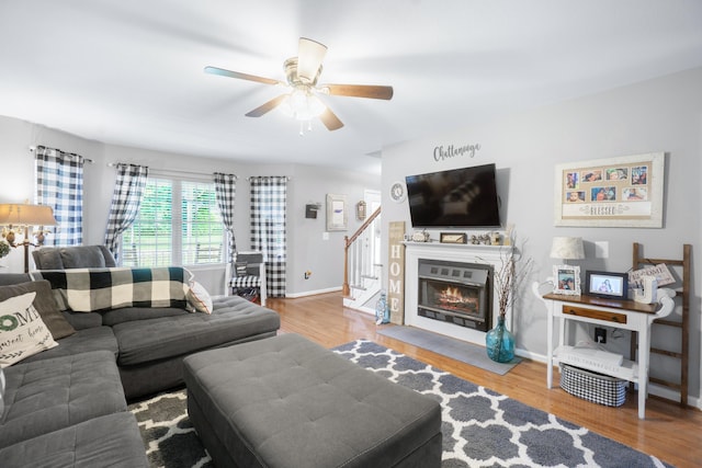 8202 Iris Rd, Chattanooga, TN 37421 - living area featuring stairway, a ceiling fan, and wood finished floors