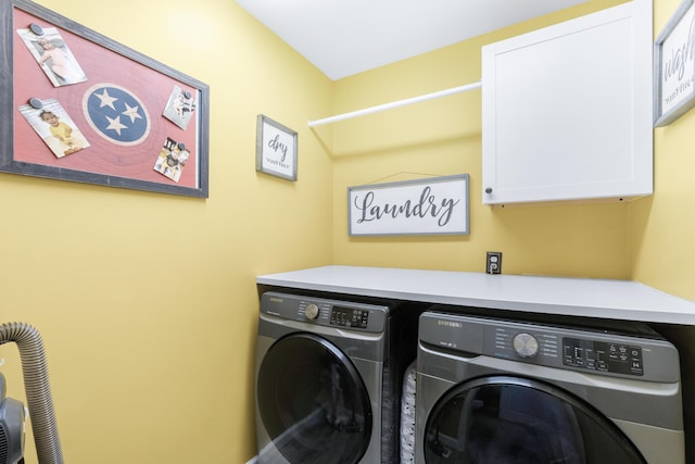 8202 Iris Rd, Chattanooga, TN 37421 - washroom with cabinet space and washer and clothes dryer