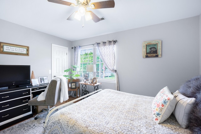 8202 Iris Rd, Chattanooga, TN 37421 - bedroom with wood finished floors and a ceiling fan