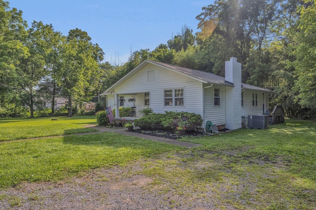 176 Depot St, Soddy Daisy, TN 37379 - bungalow featuring a front yard, a chimney, and a porch
