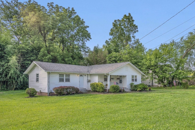 176 Depot St, Soddy Daisy, TN 37379 - view of front of property featuring a front yard, a shingled roof, and covered porch