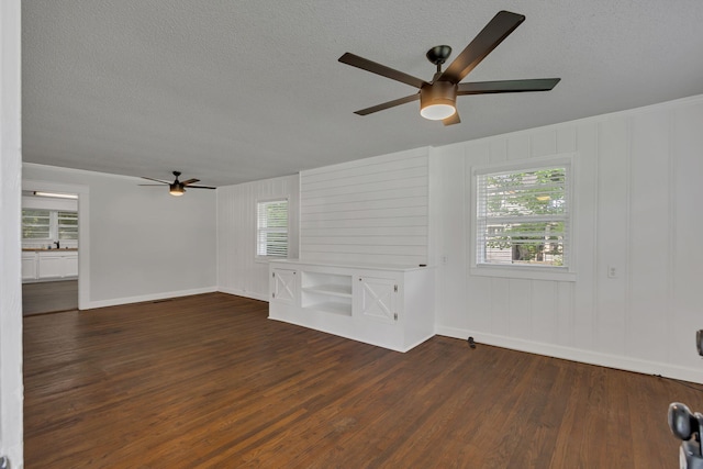 176 Depot St, Soddy Daisy, TN 37379 - unfurnished living room featuring ceiling fan, a textured ceiling, and dark wood-style flooring
