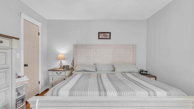 4111 Lost Oaks Dr, Ooltewah, TN 37363 - bedroom with wood finished floors and baseboards