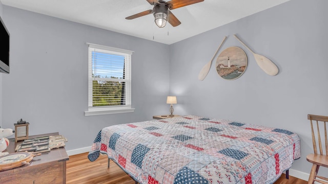 4111 Lost Oaks Dr, Ooltewah, TN 37363 - bedroom with wood finished floors and a ceiling fan