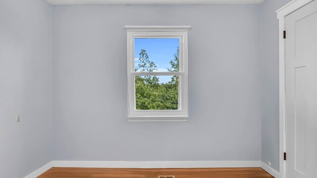 4111 Lost Oaks Dr, Ooltewah, TN 37363 - spare room with baseboards and wood finished floors
