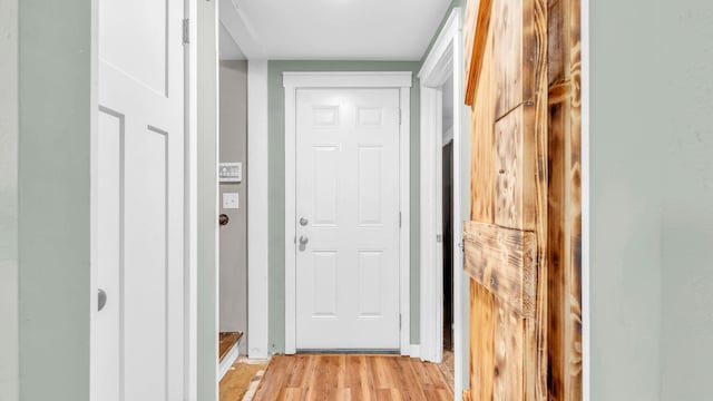 4111 Lost Oaks Dr, Ooltewah, TN 37363 - doorway with light wood-style flooring and baseboards