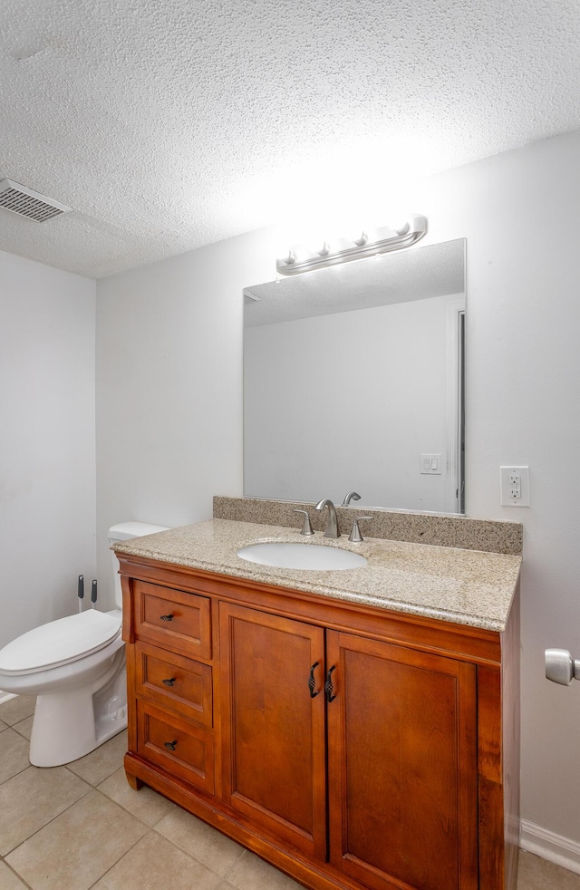 8217 Rolling Stone Ln, Ooltewah, TN 37363 - half bathroom featuring vanity, a textured ceiling, and tile patterned flooring