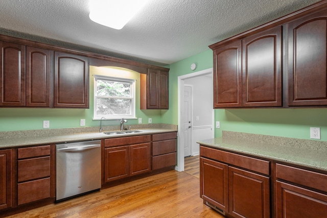 8217 Rolling Stone Ln, Ooltewah, TN 37363 - kitchen with stainless steel dishwasher, light wood-type flooring, a textured ceiling, and light countertops
