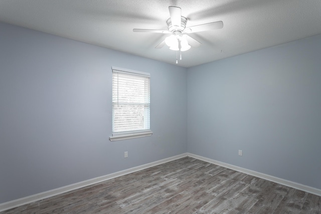 8217 Rolling Stone Ln, Ooltewah, TN 37363 - spare room with wood finished floors and ceiling fan
