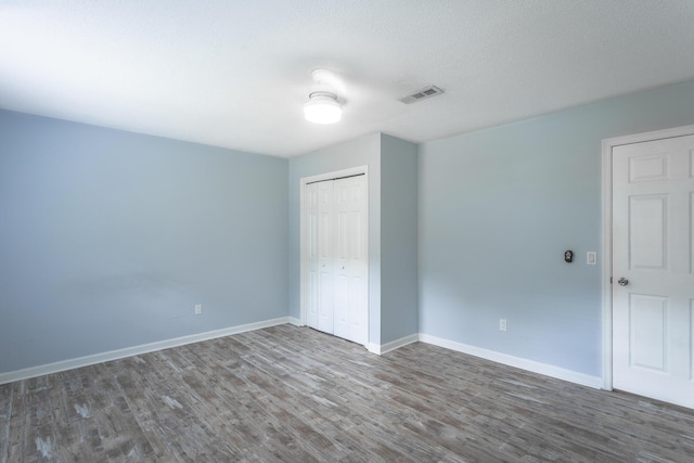 8217 Rolling Stone Ln, Ooltewah, TN 37363 - unfurnished room with wood finished floors and baseboards