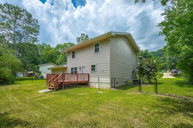 8217 Rolling Stone Ln, Ooltewah, TN 37363 - back of house featuring a deck and a gate