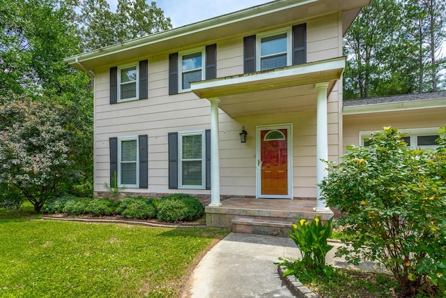 8217 Rolling Stone Ln, Ooltewah, TN 37363 - view of front of home featuring a front lawn