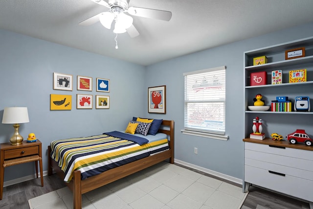 8217 Rolling Stone Ln, Ooltewah, TN 37363 - bedroom featuring ceiling fan and a textured ceiling