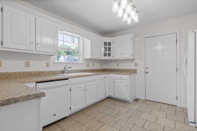 40 Castleview Ct, Ringgold, GA 30736 - kitchen with white appliances, white cabinets, and light countertops