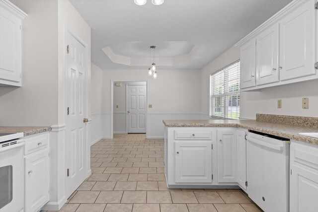 40 Castleview Ct, Ringgold, GA 30736 - kitchen featuring dishwasher, light countertops, range, and white cabinets