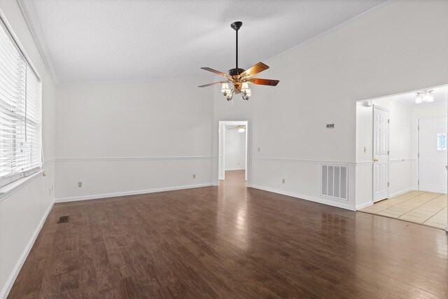 40 Castleview Ct, Ringgold, GA 30736 - unfurnished living room with a ceiling fan, plenty of natural light, wood finished floors, lofted ceiling, and ornamental molding