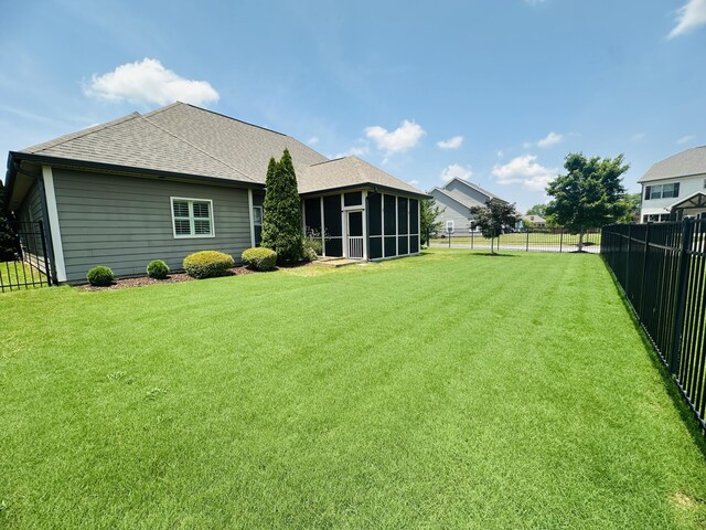 8594 River Birch Loop, Ooltewah, TN 37363 - fenced backyard featuring a sunroom