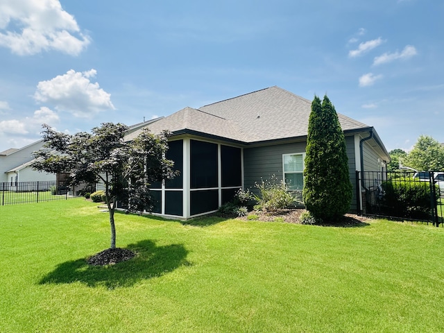 8594 River Birch Loop, Ooltewah, TN 37363 - back of property with a sunroom and a shingled roof