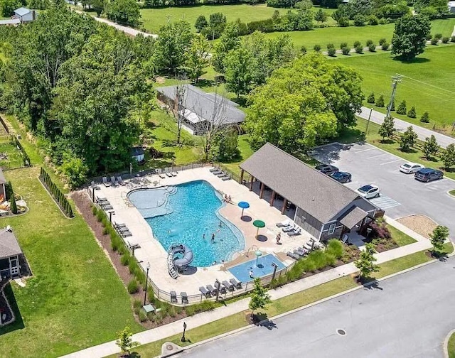 8594 River Birch Loop, Ooltewah, TN 37363 - aerial view of a pool and a tree filled landscape