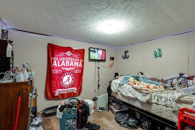 4259 Keith Valley Rd, Cohutta, GA 30710 - bedroom with a textured ceiling and wood finished floors