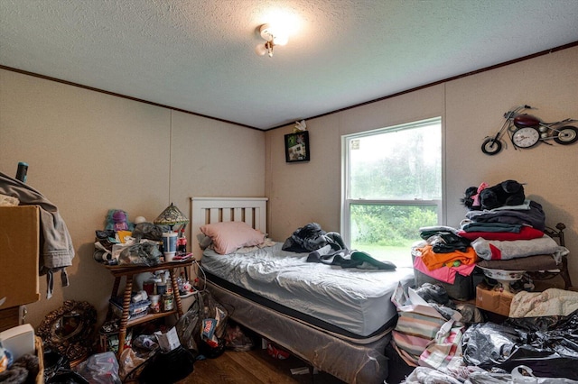4259 Keith Valley Rd, Cohutta, GA 30710 - bedroom with ornamental molding, a textured ceiling, and wood finished floors