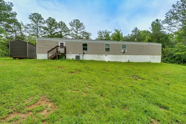 4259 Keith Valley Rd, Cohutta, GA 30710 - rear view of house featuring a yard and a storage unit