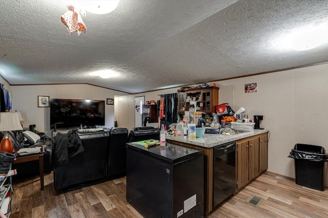 4259 Keith Valley Rd, Cohutta, GA 30710 - kitchen with light wood-style flooring, dishwasher, lofted ceiling, a textured ceiling, and open floor plan
