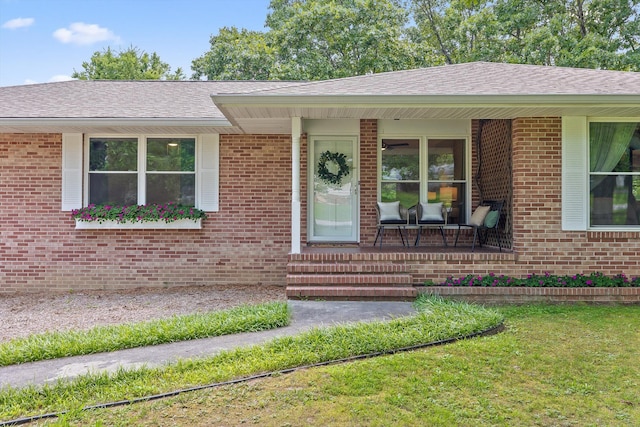 28 Lynn Rd, Signal Mountain, TN 37377 - view of front of home with covered porch, brick siding, and roof with shingles