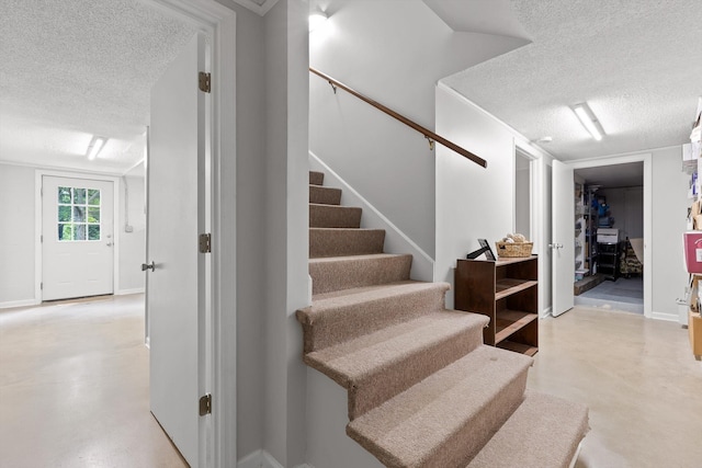 28 Lynn Rd, Signal Mountain, TN 37377 - stairway featuring a textured ceiling and concrete flooring