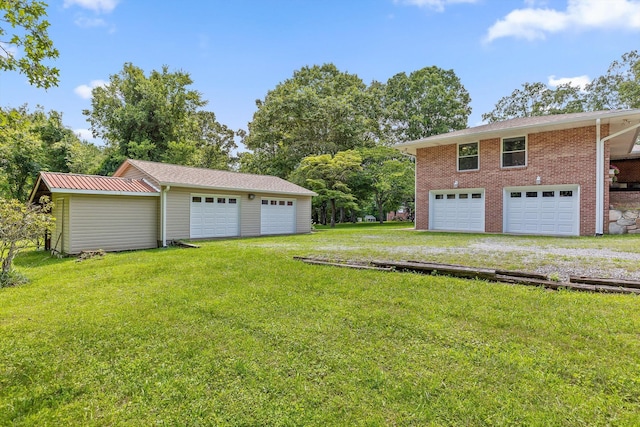 28 Lynn Rd, Signal Mountain, TN 37377 - view of grassy yard with a garage and an outdoor structure