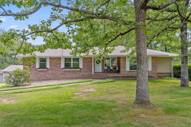 28 Lynn Rd, Signal Mountain, TN 37377 - single story home with brick siding, a front yard, and a shingled roof