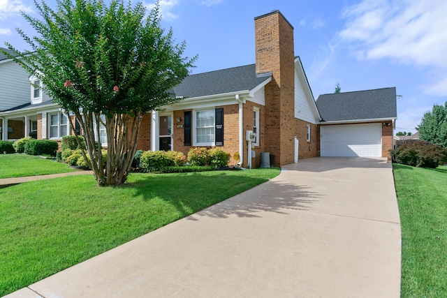 6756 Hickory Manor Cir, Chattanooga, TN 37421 - view of front of home featuring brick siding, concrete driveway, and a front yard