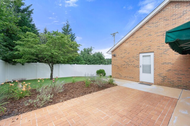 6756 Hickory Manor Cir, Chattanooga, TN 37421 - fenced backyard with a patio area