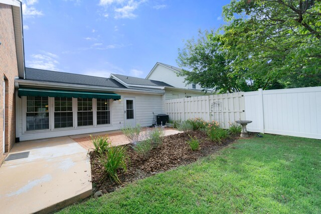 6756 Hickory Manor Cir, Chattanooga, TN 37421 - view of yard featuring a patio area