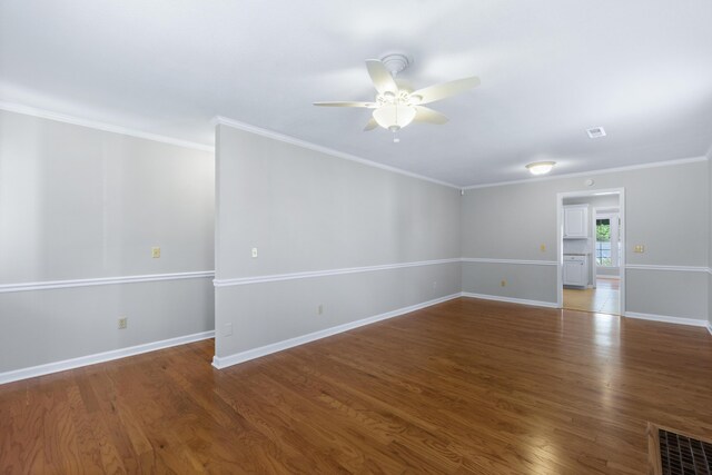 6756 Hickory Manor Cir, Chattanooga, TN 37421 - empty room with ceiling fan, wood finished floors, and ornamental molding