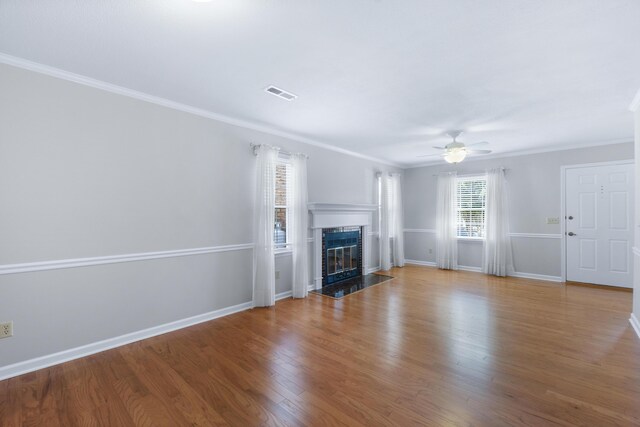 6756 Hickory Manor Cir, Chattanooga, TN 37421 - unfurnished living room with a glass covered fireplace, wood finished floors, a ceiling fan, and ornamental molding