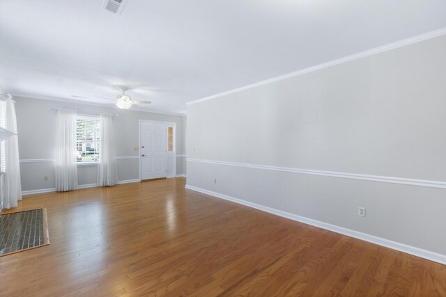 6756 Hickory Manor Cir, Chattanooga, TN 37421 - unfurnished living room with ceiling fan, light wood-style floors, and crown molding