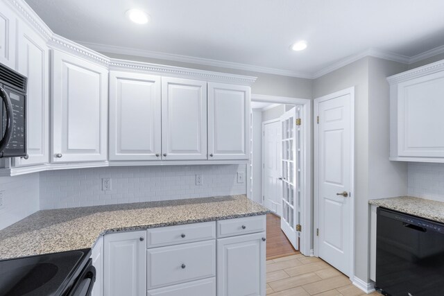 6756 Hickory Manor Cir, Chattanooga, TN 37421 - kitchen featuring black appliances, white cabinetry, decorative backsplash, crown molding, and light stone countertops