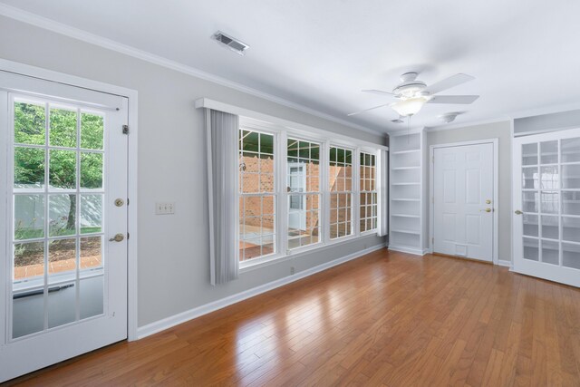 6756 Hickory Manor Cir, Chattanooga, TN 37421 - foyer with ornamental molding, ceiling fan, and wood finished floors