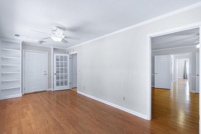 6756 Hickory Manor Cir, Chattanooga, TN 37421 - empty room featuring ceiling fan, ornamental molding, and wood finished floors