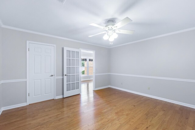 6756 Hickory Manor Cir, Chattanooga, TN 37421 - unfurnished room with a ceiling fan, light wood finished floors, and crown molding